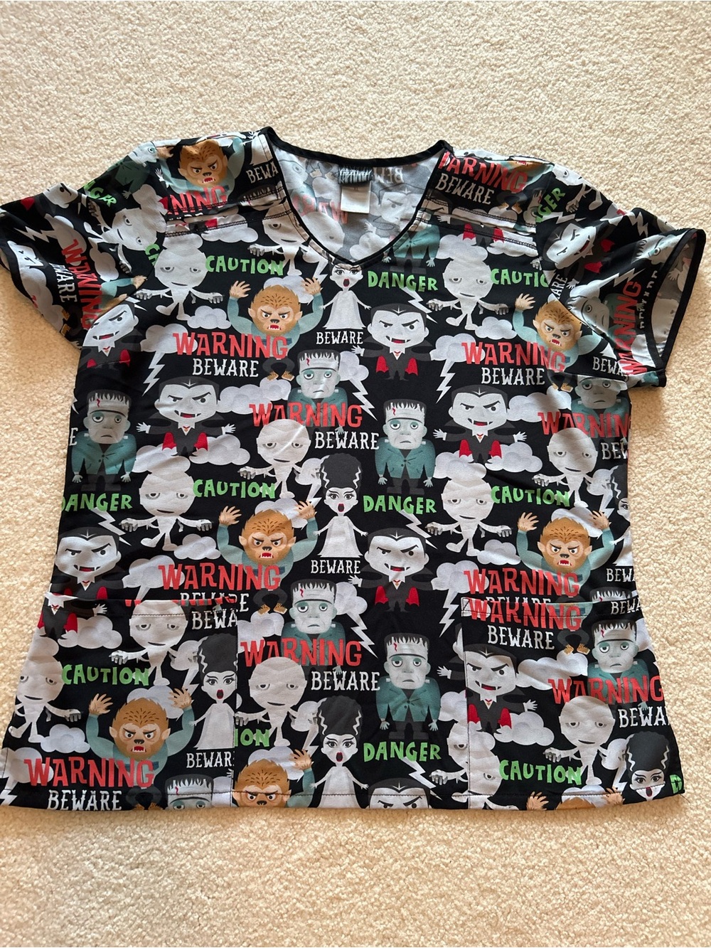 Universal Monsters V Neck Women’s Short Sleeve Scrubs Top